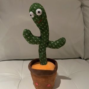 Singing cactus. Never needs water. Just Batterties.